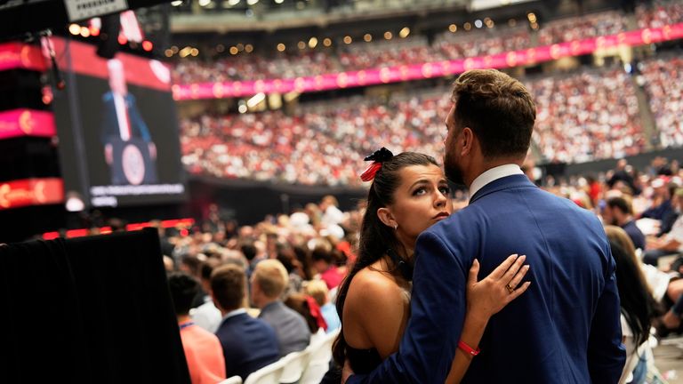 Attendees listen as President Donald Trump speaks. Pic: AP