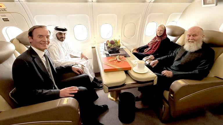 Qatari and British diplomats with Barbie and Peter Reynolds on the flight to Doha