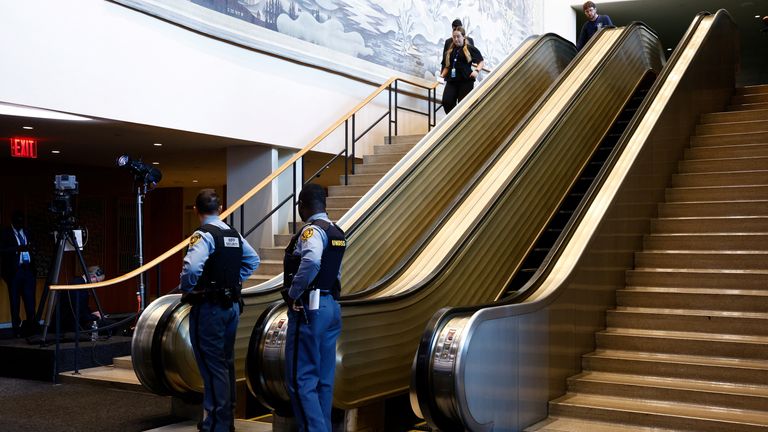 Security personnel stand next to the escalator. Pic: Reuters