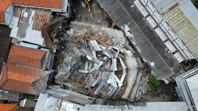 Dozens are feared still trapped under the rubble. Pic: AP