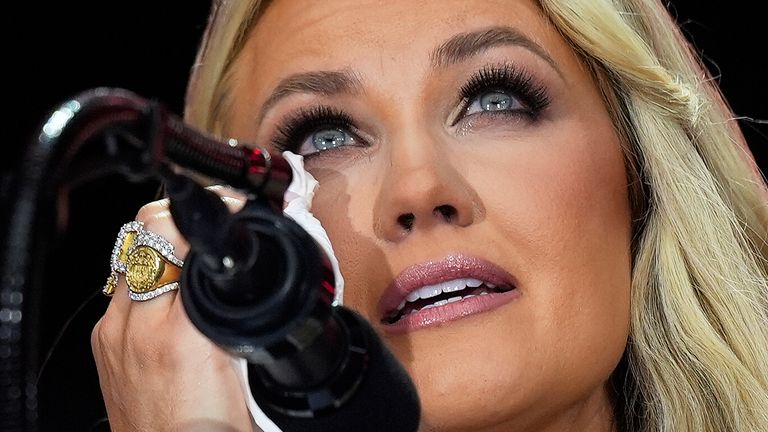 Erika Kirk wipes tears from her eyes during her speech. Pic: AP