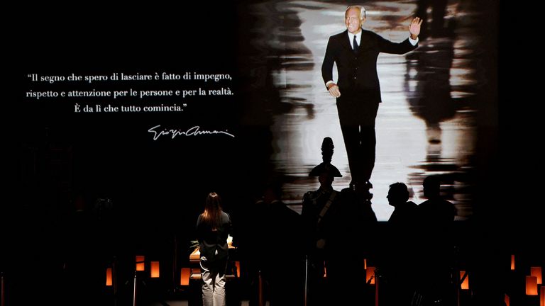The view from inside the theatre, where Armani's casket lies below his parting quote. Pic: Reuters