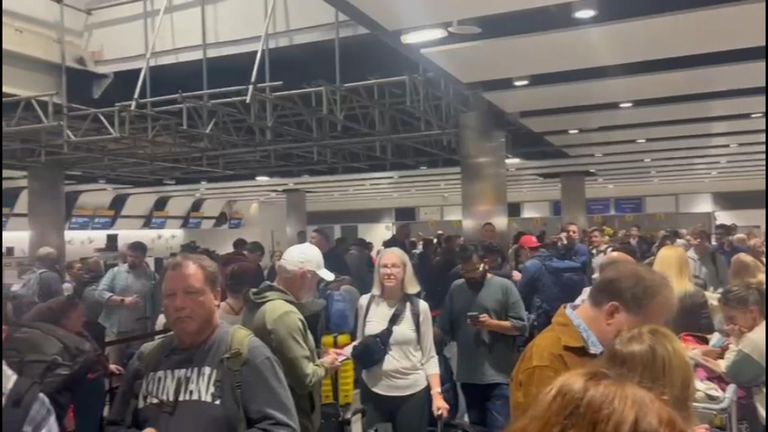 Queues form as delays hit Heathrow Airport.