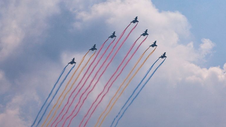 J-10 aerobatic jets flying over Tiananmen Square. Pic: Reuters