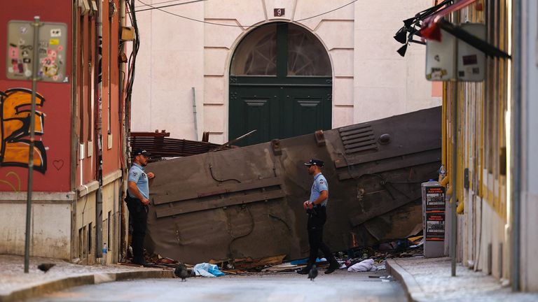 The crashed carriage on its side at the scene on Thursday morning. Pic: Reuters