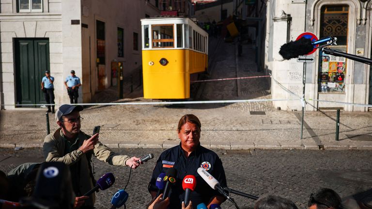 A member of the Civil Protection authority gives a news conference near the crash site on Thursday morning. Pic: Reuters