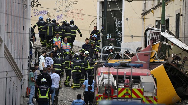 Emergency services work at the scene on Wednesday. Pic: Reuters