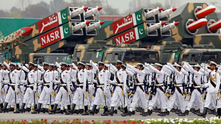 Pakistani navy personnel march at a military parade in Islamabad in March 2019. Pic: Reuters