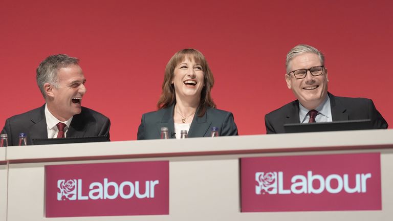 Peter Kyle, Rachel Reeves and Keir Starmer on stage ahead of her keynote speech. Pic: PA