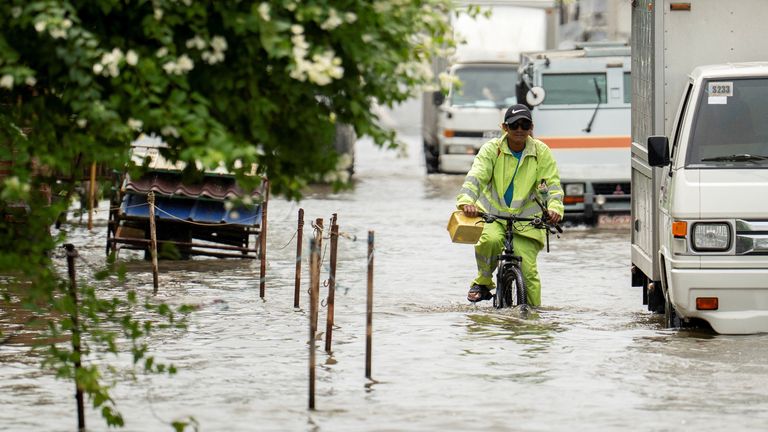 Roads were flooded in Apalit, Philippines. Pic: Reuters