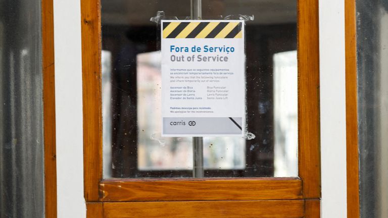 A poster attached to one of the funicular carriages warns the transport system is out of service. Pic: Reuters
