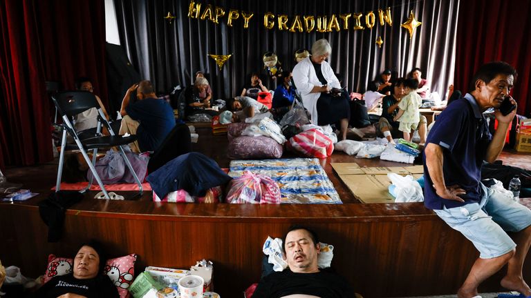 People shelter inside an elementary school in Hualien, Taiwan. Pic: Reuters