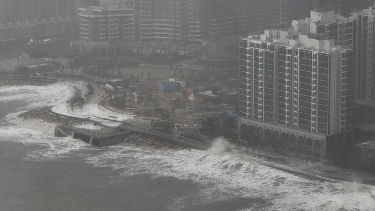 Waves crash onto the shore at Tseung Kwan O, in Hong Kong. Pic: Reuters