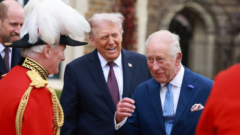 The pair appeared to share a laugh ahead of the carriage procession. Pic: PA