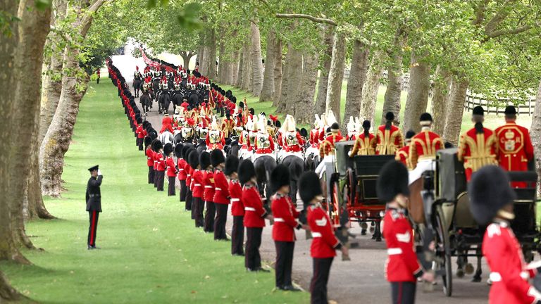 The horse-drawn procession makes its way towards Windsor Castle.
Pic: Reuters