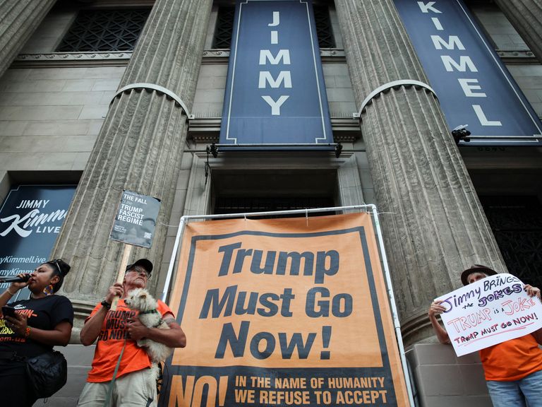 People protesting outside the centre where Kimmel's show is filmed. Pic: Reuters