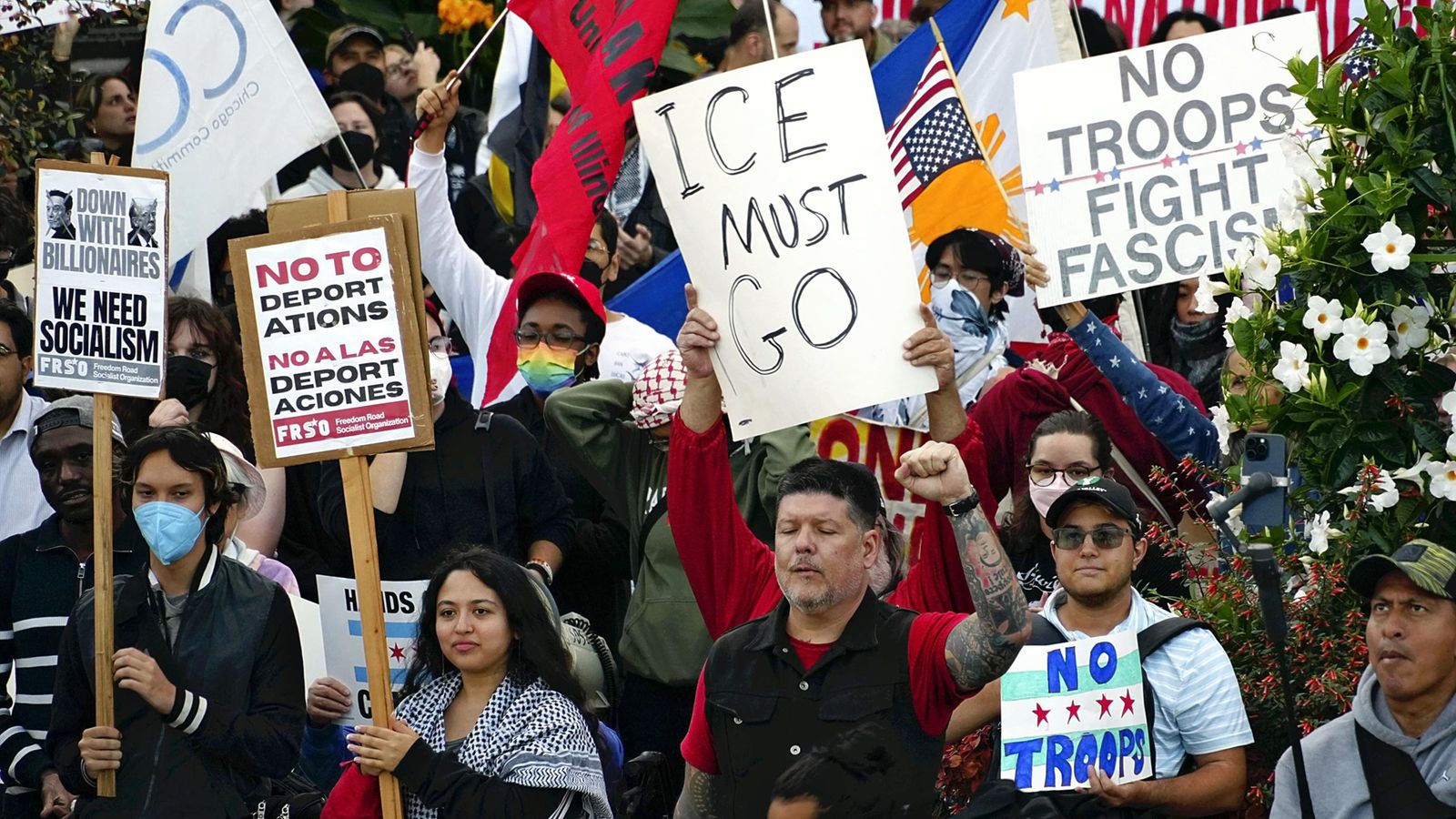 The pulse of a city on edge - hundreds protest Trump's plan to deploy troops in Chicago