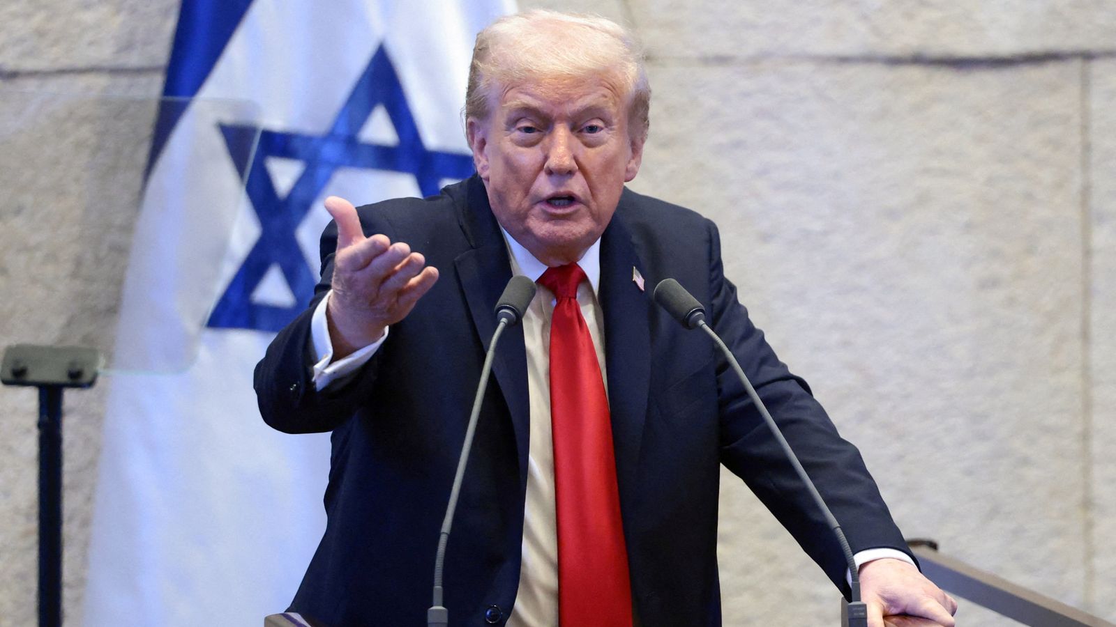 Trump heckled as he tells Israeli parliament peace deal marks ‘historic dawn of a new Middle East’