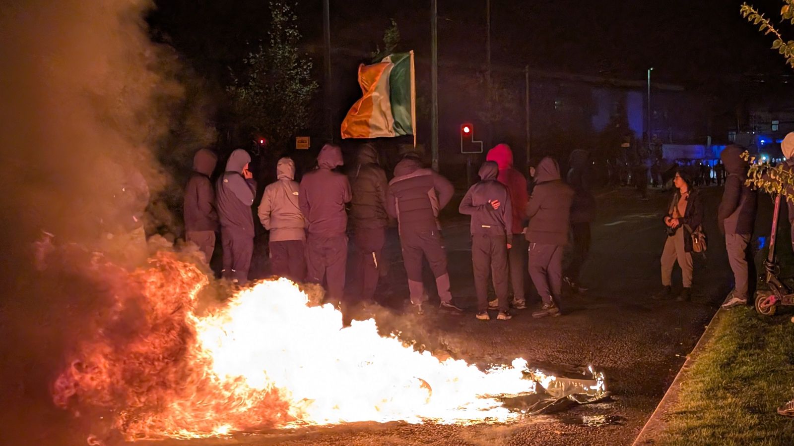 Police helicopter targeted with lasers by 'mob intent on violence' in Dublin