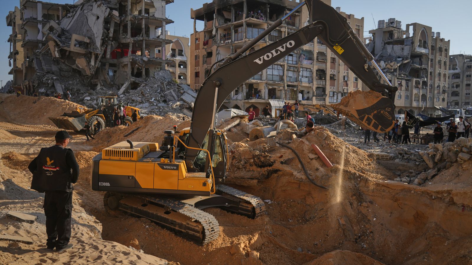 Israel allows Red Cross and Egyptian teams into Gaza as search for bodies of hostages widens