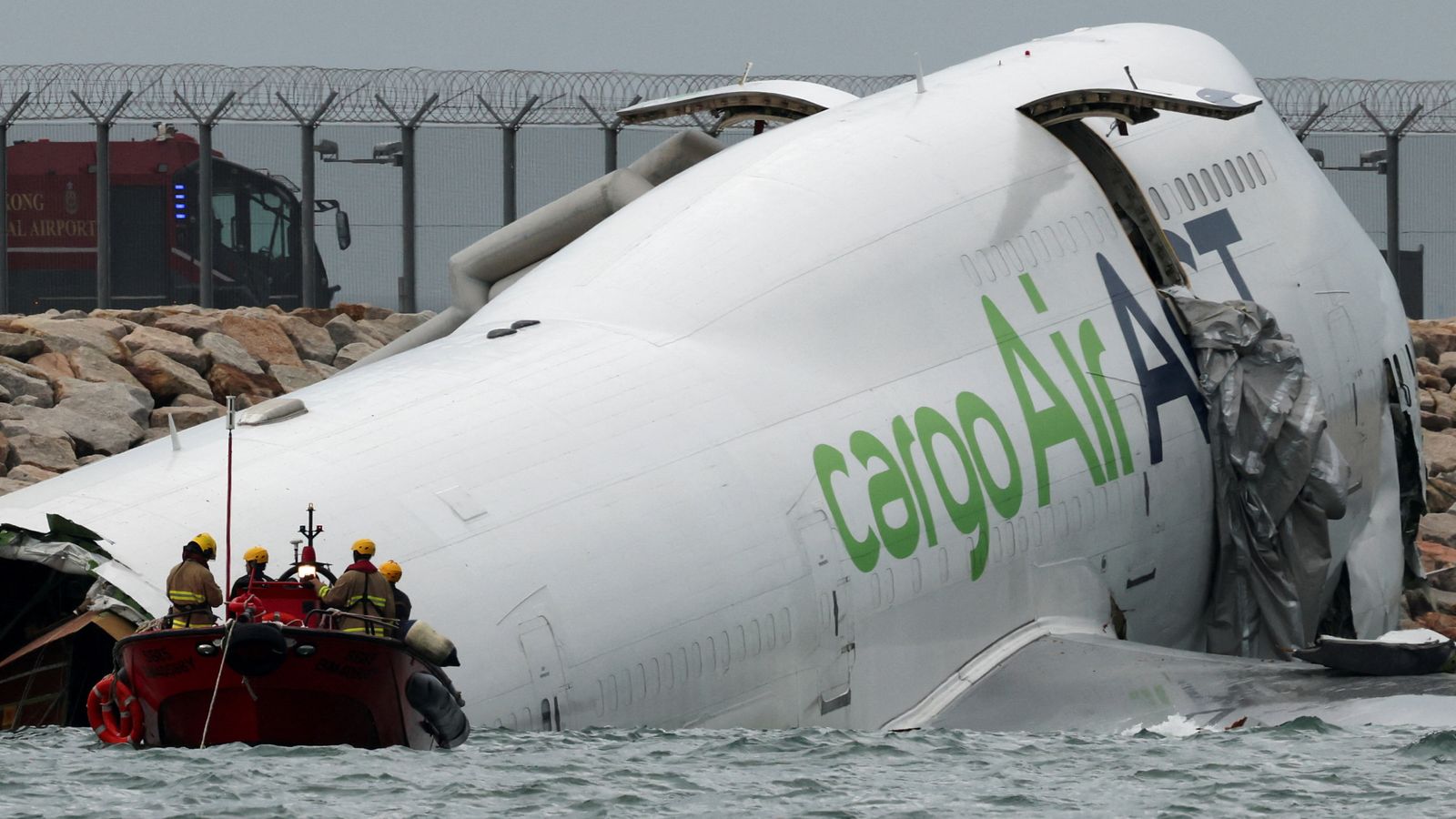 Cargo plane slides off runway in Hong Kong – reports say two dead