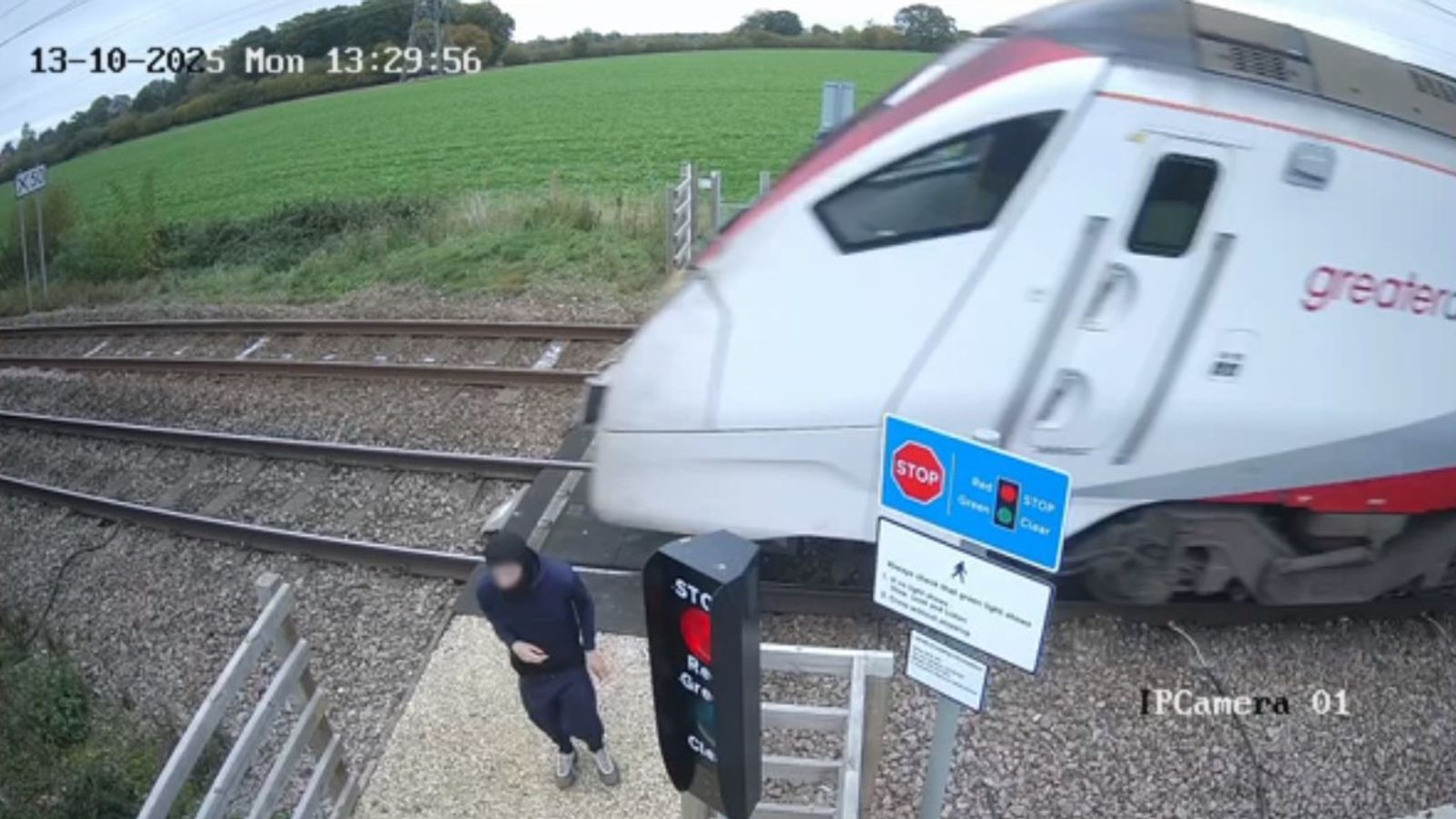 Teenager filmed inches from being hit by train as they 'risk everything' for 'game' Teenager filmed inches from being hit by train as they 'risk everything' for 'game'