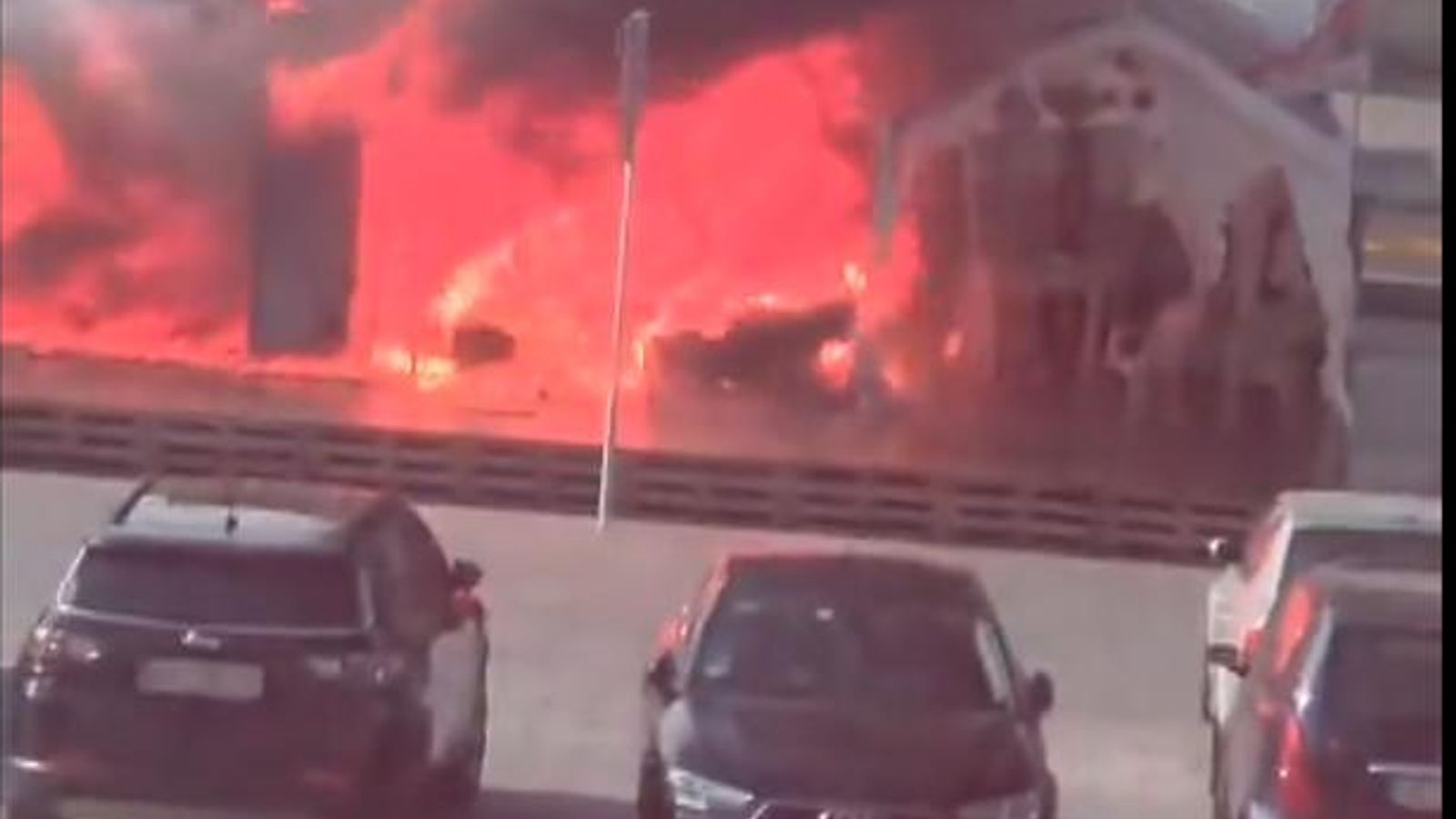 Shots fired outside Serbian parliament as fire breaks out