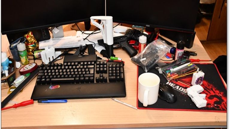 Printed gun parts on Adamski's desk. Pic: Met Police