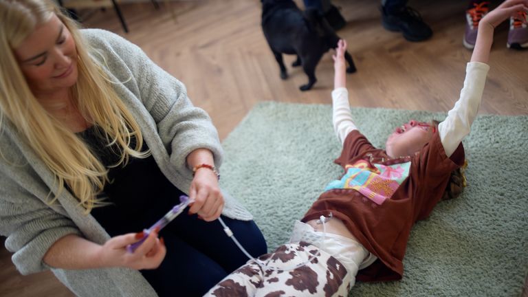 Shelley feeding Missy