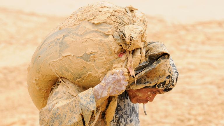 A man works at the site of a rare earth metals mine at Nancheng county, Jiangxi province, China. File pic: Reuters