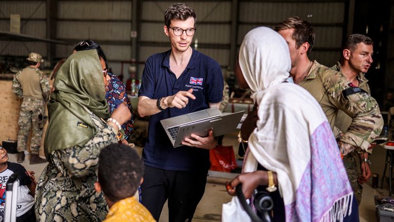 A Foreign Office team member helping evacuees in Cyprus in 2023. File pic: Reuters