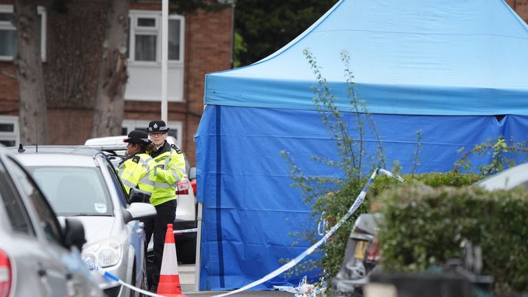 Forensic officers in Midhurst Gardens in Uxbridge.
Pic: PA