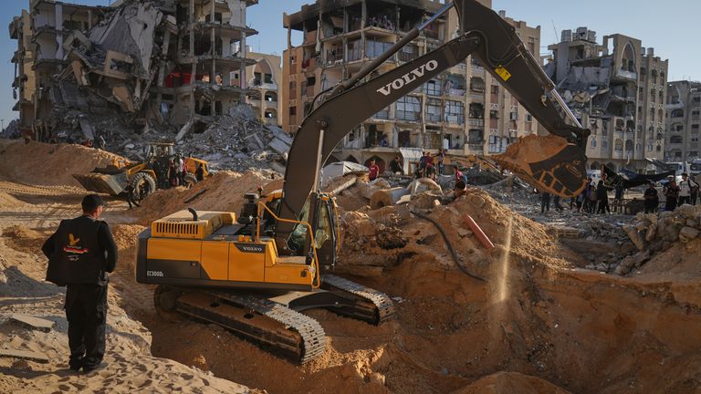 Israel allows Egyptian and Red Cross teams into Gaza as search for hostage bodies expands