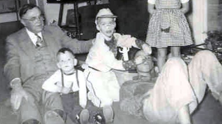 A C Lee (L) - the inspiration for Atticus Finch with his grandchildren, including Edwin Conner (C), in 1953