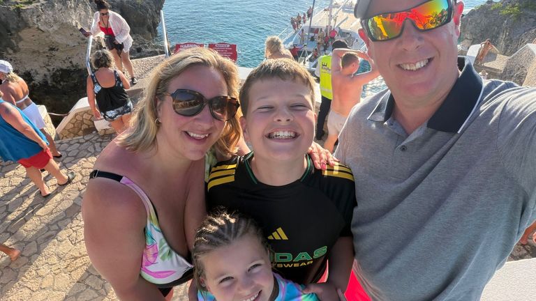 David Rowe with his wife Abby, daughter Cora, eight, and son Ethan, 12, during their holiday in Jamaica.  Pic: PA/handout