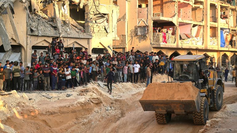 Trenches have been dug in the Khan Younis area of Gaza in the search for bodies. Pic: AP