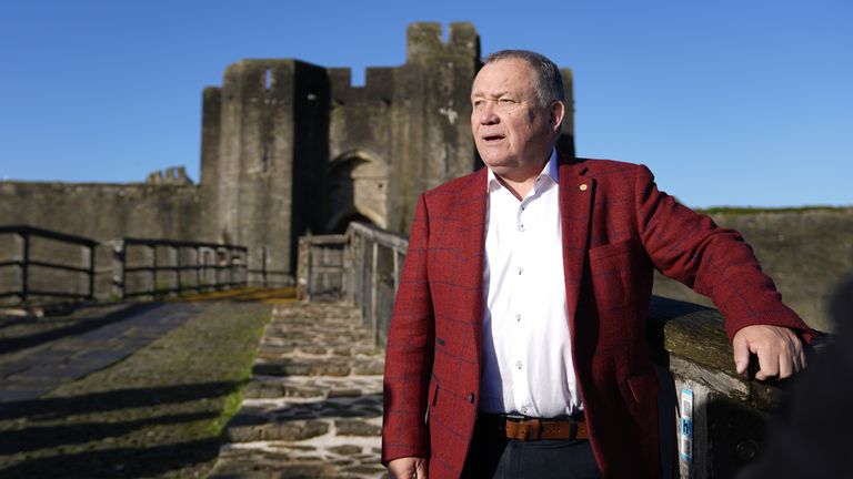 Lindsay Whittle in front of the Caerphilly Castle after his victory. Pic: PA