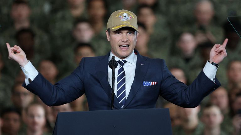 US Secretary of War Pete Hegseth speaking to troops on the aircraft carrier USS George Washington, in Japan. Pic: Reuters