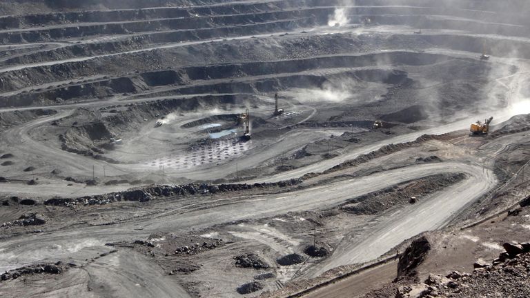 Miners are seen at the Bayan Obo mine containing rare earth minerals, in Inner Mongolia, China. File pic: Reuters