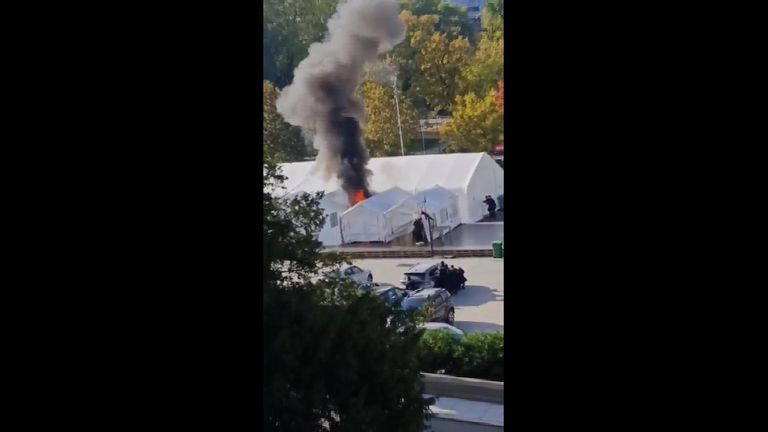 Shots fired outside Serbian parliament as fire breaks out