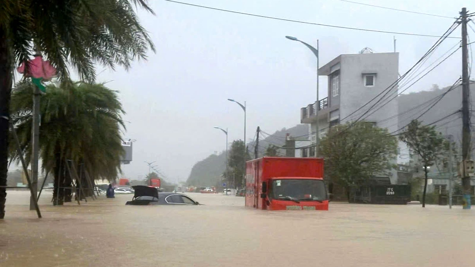 55 dead in Vietnam after torrential rain triggers flooding and landslides