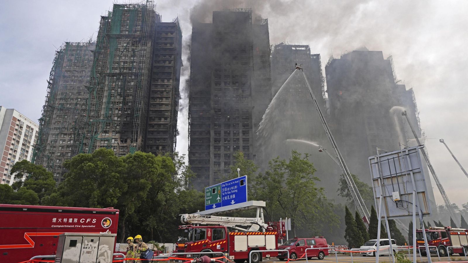 Police make arrests over huge Hong Kong flats fire - with dozens killed and more still missing