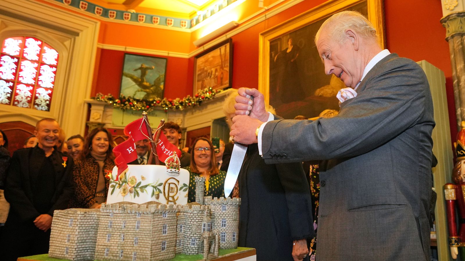 King celebrates 77th birthday with royal visit to Wales