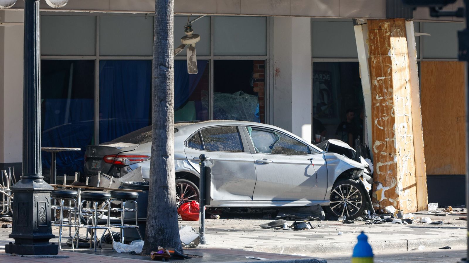 Four killed and 11 injured after car fleeing police smashes into Florida bar
