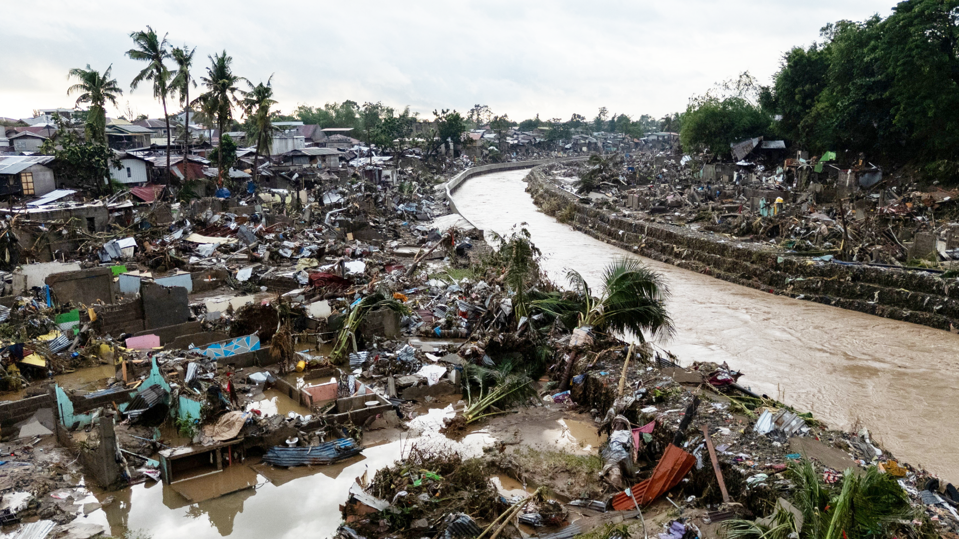 Aerial images show destruction of Typhoon Kalmaegi in Philippines - with at least 66 killed