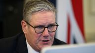 Keir Starmer faces a screen, while participants attend by video link, as he co-chairs the Coalition of the Willing.
Pic: Reuters