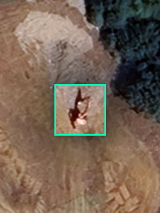 An excavator is visible at the waste site in June this year