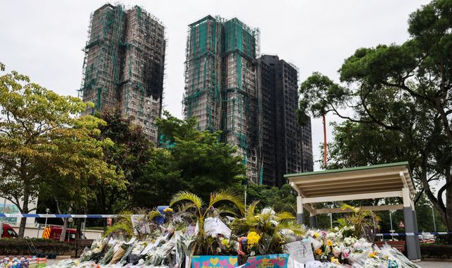 Death toll rises to 146 in Hong Kong apartment complex fire as more bodies found in burned buildings