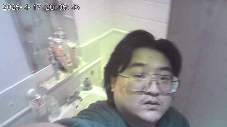 Chao Xu setting up his camera
Pic: Met Police: