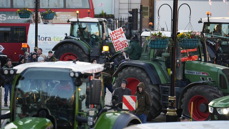 Dozens of farmers drove their tractors to Whitehall on Wednesday morning. Pic: PA